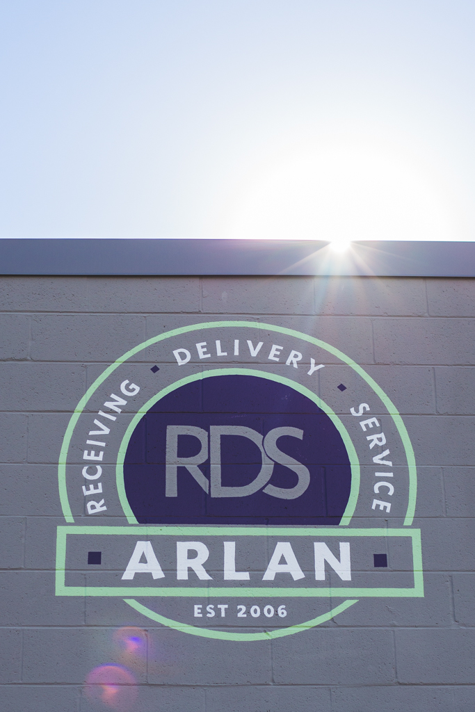 Arlan logo on building exterior